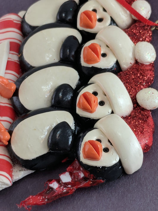 Toboggan Penguins With A Head Christmas Ornament