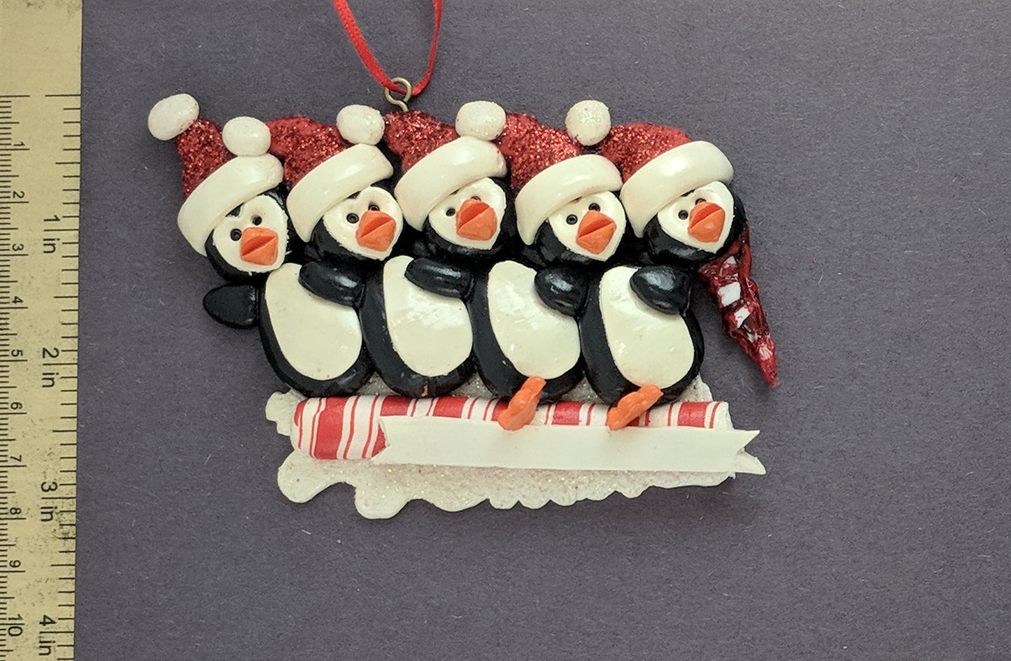 Toboggan Penguins With A Head Christmas Ornament