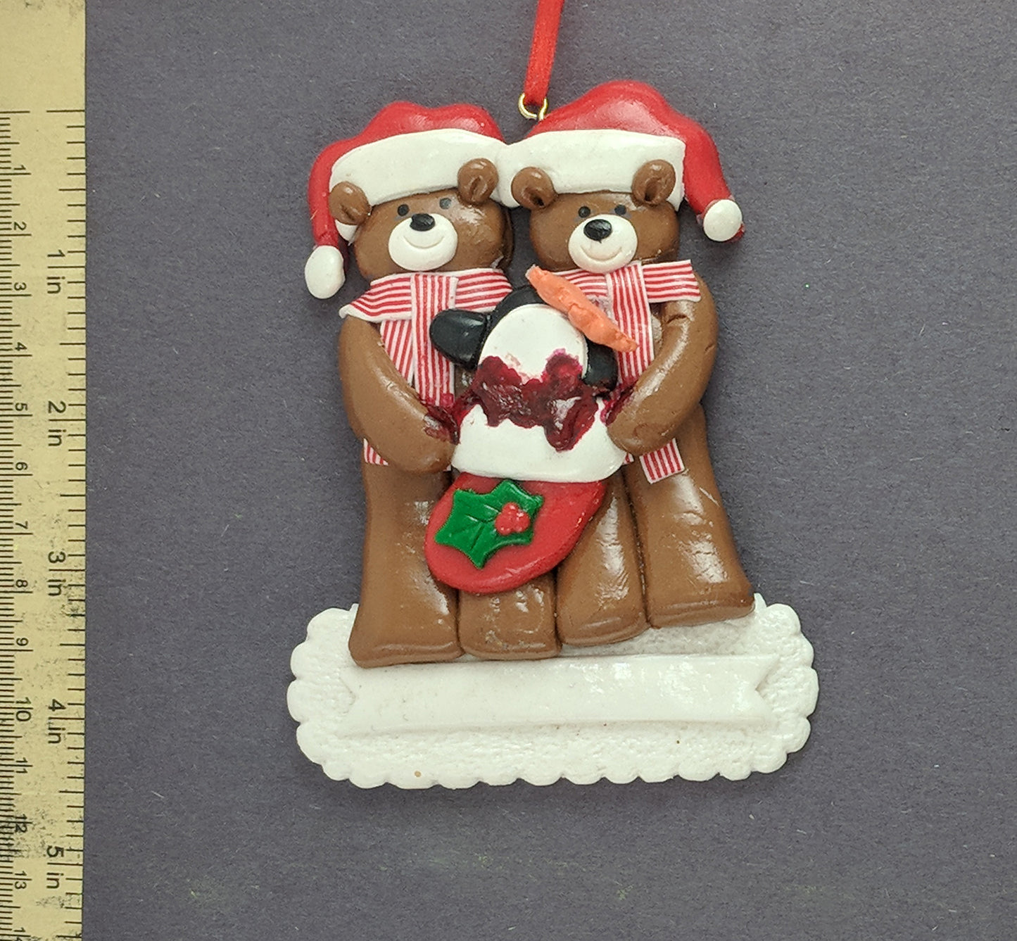 Teddy Bear Couple With Penguin In A Stocking Christmas Ornament